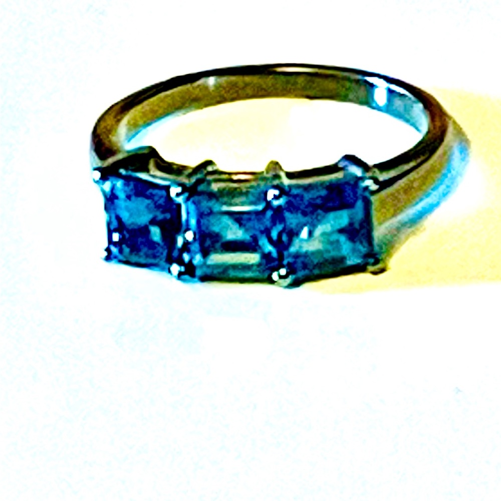Authentic three stone, London, blue topaz and black rhodium